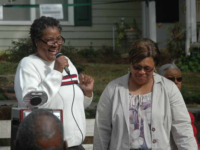 NC WARN Organizing Director Connie Leeper congratulating Selina on her perseverance in bringing the project to fruition.